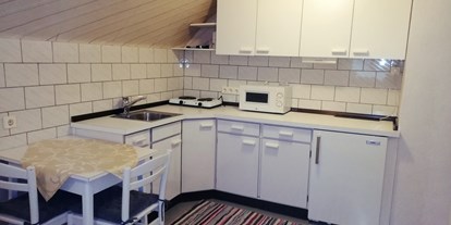 Pensionen - Umgebungsschwerpunkt: Stadt - Steiermark - Küche im Apartment "Panorama" - Frühstückspension Hermine Fraiß