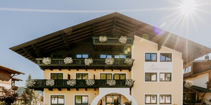 Pensionen - Garage für Zweiräder - Salzburg - Außenansicht im Sommer - B&B Hotel Die Bergquelle