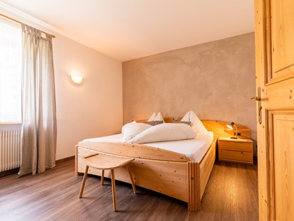 Pensionen - Dolomiten - Schlafzimmer 2 Gardensuite Apartment LATEMAR - Haus Christian 