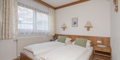Pensionen - Garten - Uttenhofen - Schlafzimmer Appartement  - Pension Weinschreiber