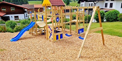 Pensionen - Terrasse - Wängle - hauseigener Spielplatz für unsere kleinen Gäste - Landhaus Wildschütz - Ferienwohnungen mit Königscard