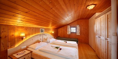 Pensionen - Umgebungsschwerpunkt: Therme - Blumau (Trentino-Südtirol) - Schlafzimmer in der Ferienwohnung - Steinerhof Hafling