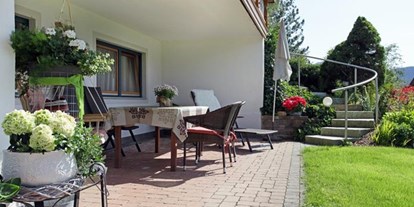 Pensionen - Garten - Walchsee - Ferienwohnungen Exenberger