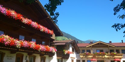 Pensionen - Umgebungsschwerpunkt: Berg - Ried im Zillertal - Ansicht Landhaus Gredler und Ferienhaus Gredler - Landhaus Gredler