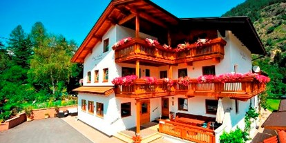 Pensionen - Frühstück: Frühstücksbuffet - Seefeld in Tirol - Hausansicht - Pension und Ferienwohnung Haus Gisela