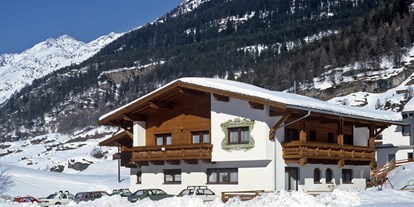 Pensionen - PLZ 6528 (Österreich) - Ausenansicht im Winter - Garni Jaqueline