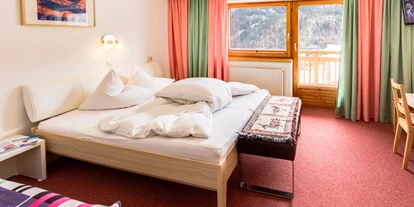 Pensionen - Restaurant - Tirol - Apart Edelweiß Schlafzimmer - Pension Edmund