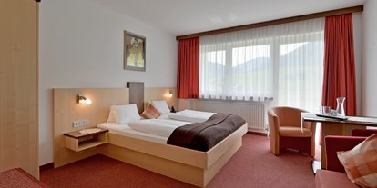 Pensionen - Umgebungsschwerpunkt: Berg - Übersee - Kaiserblickzimmer  - Hotel Garni Tirol im Kaiserwinkel