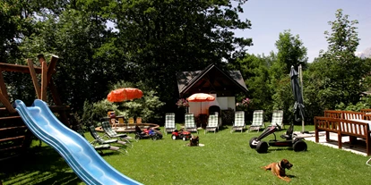 Pensionen - Spielplatz - Sankt Johann im Pongau - Gemütliche Stunden in unserem gepflegten Garten - Pension-Appartements Ötzmooshof ***