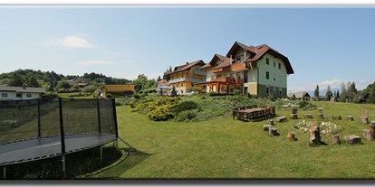 Pensionen - Balkon - Faakersee - Trampolin und Lagerfeuerstelle - Gästehaus Karoline