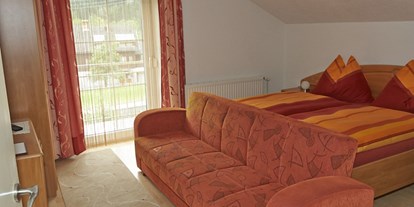 Pensionen - Fahrradverleih - Lavant - Zimmer 3 mit Schlafsofa (Zusatzbett), Obergeschoss - Ferienhaus Jantscher