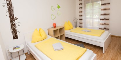 Pensionen - WLAN - Köflach - AP5 Schlafzimmer - Ferienwohnung-Zimmer Yassi 