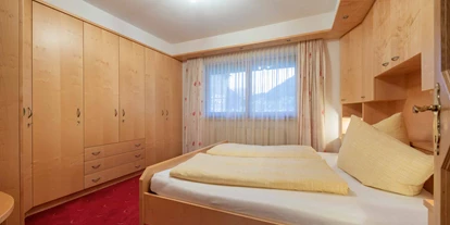 Pensionen - Sauna - Igls - Schlafzimmer vom Apartment Brennerspitz - Landhaus Hofer