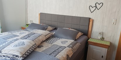 Pensionen - Umgebungsschwerpunkt: Berg - 2 getrennte Schlafzimmer in jeder Wohnung - KOMFORT-FEWO BERGWELT HAHNENKAMM   - Lechtal - So/Wi