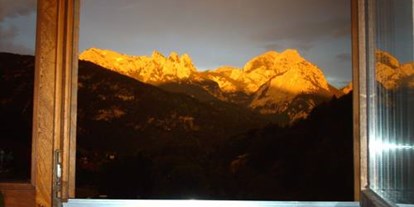 Pensionen - Umgebungsschwerpunkt: Berg - PLZ 5091 (Österreich) - Blick auf das Alpenglühen vom Frühstücksraum - Haus Helga
