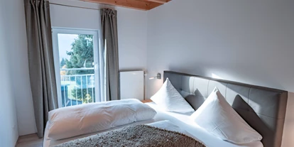Pensionen - Umgebungsschwerpunkt: See - Tirol - Schlafzimmer Ferienwohnung Sorgschrofen - Am Hof Jungholz
