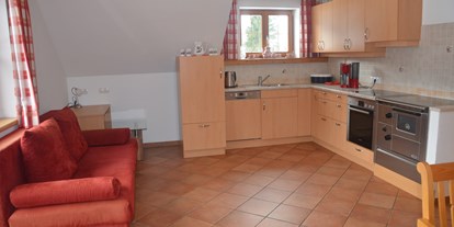 Pensionen - PLZ 5562 (Österreich) - Küche und Schlafcouch - Ferienwohnung Auenschuster