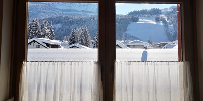 Pensionen - Sauna - Kärnten - Haus Scheiblauer Nassfeld Tröpolach skiing apartment 21 view to the slope - Haus Scheiblauer