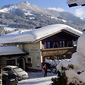Frühstückspension - Winteransicht - Gästehaus Neumayer alpine**sports**appartements - Pension Neumayer