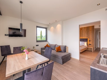 Pensionen - Restaurant - Wohnung Süd- West mit einer gemütlichen Wohnküche.
 - Pension Plarserhof
