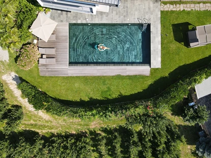 Pensionen - Restaurant - Freibad aus Quarzid Verde Gestein - Active B&B Prairerhof