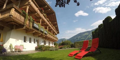Pensionen - Parkplatz: kostenlos bei der Pension - Alpbach - Sportpension Christina -Garten - Sportpension Christina