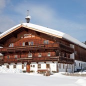 Frühstückspension - Winteridylle - Erbhof Achrainer Moosen-Ferienwohnung Alpenrose