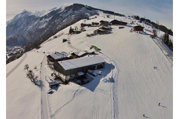 Frühstückspension: Luftaufnahme Skipiste  - Oberaigenhof Ferienwohnungen Kaprun 