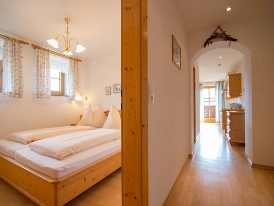 Frühstückspension: Schlafzimmer des Apartments Kornblume - Historischer Bauernhof Schabus