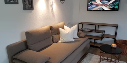 Pensionen - WLAN - Ötztal - Wohnzimmer Ferienwohnung "Acherkogelblick" - Haus Alpenglühn