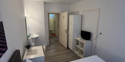 Pensionen - Restaurant - München - Zweizimmerapartment - Schlafzimmer für 1 Person - Aparthotel & Pension Belo Sono