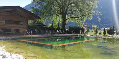 Pensionen - Parkplatz: kostenlos bei der Pension - Alpbach - Die Naturoase mit Naturbadeteich, Hüttensauna uvm. - Hotel Garni Birkenhof & Apartments Rosenhof