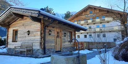 Pensionen - Parkplatz: kostenlos bei der Pension - Alpbach - Die Hüttensauna in der Gartenoase zwischen Rosenhof und Birkenhof im Zillertal - Hotel Garni Birkenhof & Apartments Rosenhof