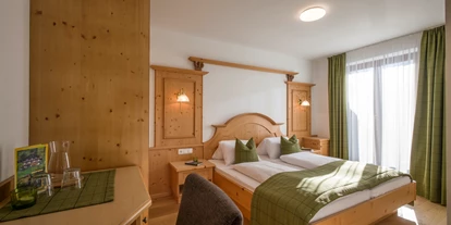 Pensionen - Parkplatz: kostenlos bei der Pension - Alpbach - Schlafzimmer - Appartements Ticklhof am See