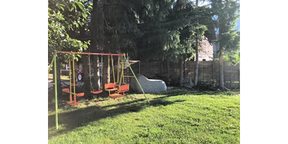 Pensionen - Parkplatz: kostenlos bei der Pension - Osttirol - Garten - Gästehaus Schlossnerhof***