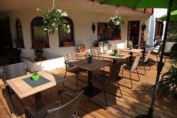 Frühstückspension: Sonnenterrasse im Garten - Landhaus Bromm