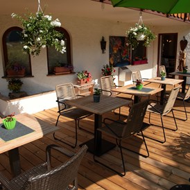 Frühstückspension: Sonnenterrasse im Garten - Landhaus Bromm