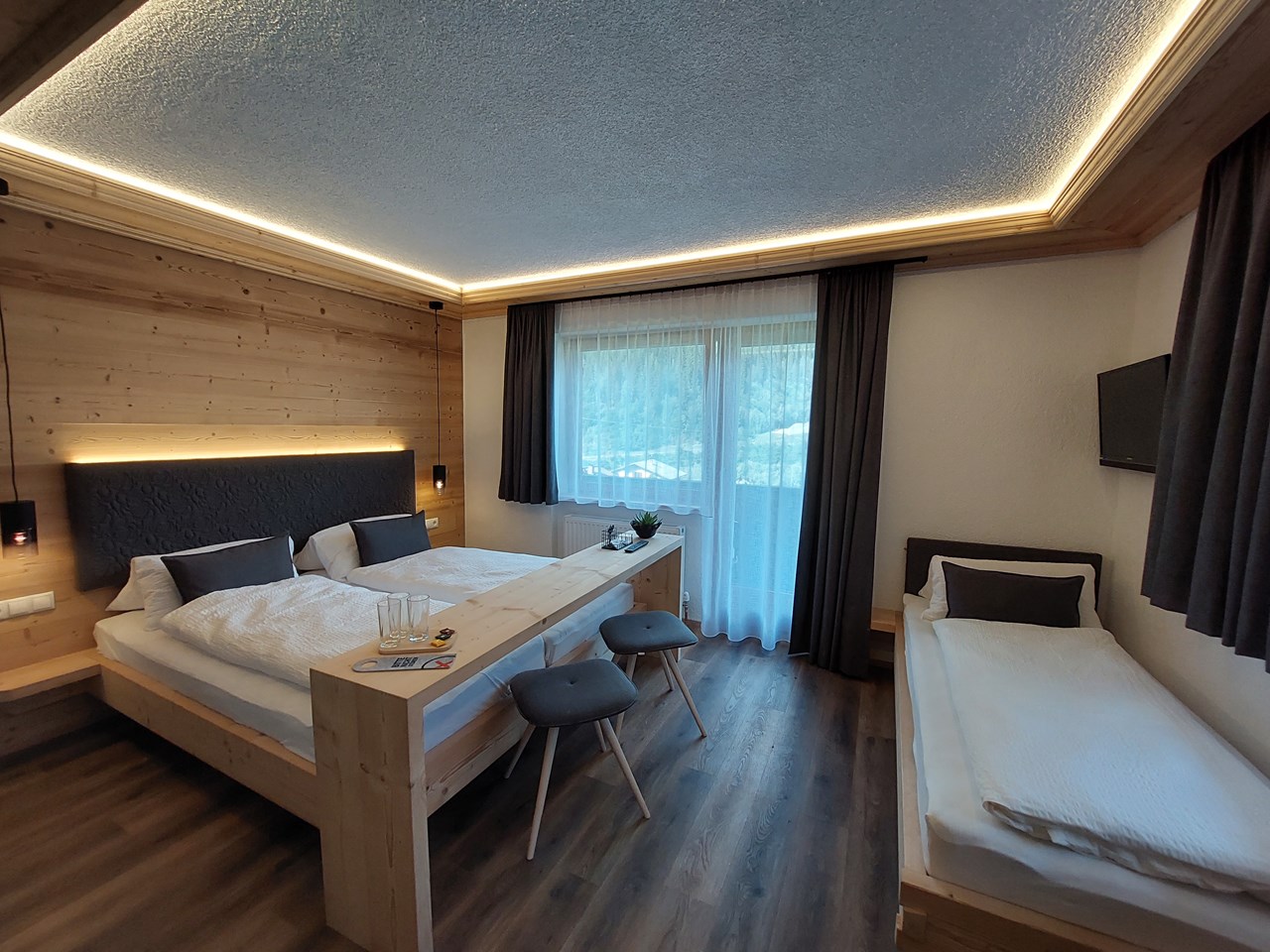 Haus Vilgrassa  Zimmerkategorien Dreibettzimmer