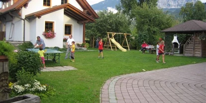 Pensionen - Restaurant - Ferienwohnung Plozner Rattendorf Spielplatz im Garten - Ferienwohnung Plozner Österreich Kärnten Nassfeld Pressegger See Hermagor