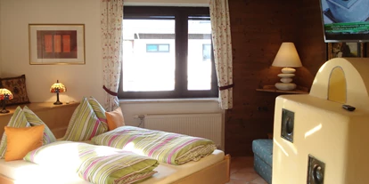 Pensionen - Parkplatz: kostenlos bei der Pension - Leogang - Appartament mit 2 Balkony und Kachelofen für 2 Erwachsene und 2 Kinder - Golf & Ski Chalet****