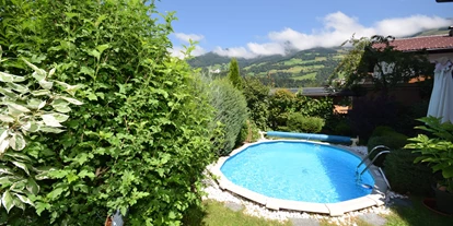 Pensionen - Parkplatz: kostenlos bei der Pension - Leogang - Garten - Golf & Ski Chalet****