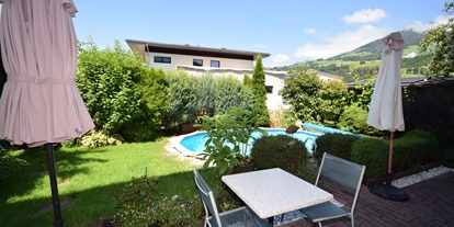 Pensionen - Parkplatz: kostenlos bei der Pension - Leogang - Garten - Golf & Ski Chalet****