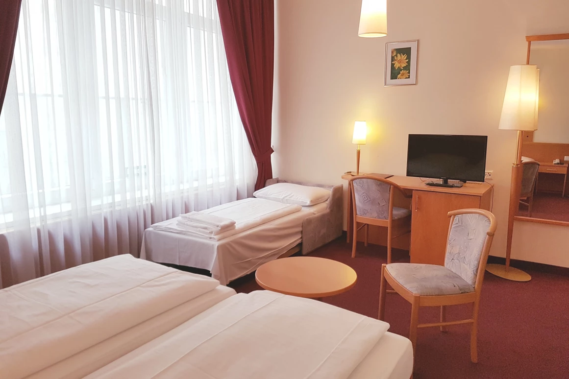 Frühstückspension: Superior Dreibettzimmer - Hotel Pension Haydn