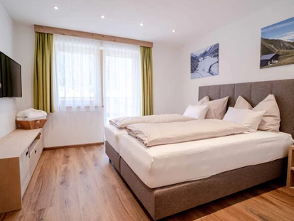 Pensionen - Balkon - Innsbruck - Schlafzimmer im Sonnenappartement - Alpengasthof Hohe Burg