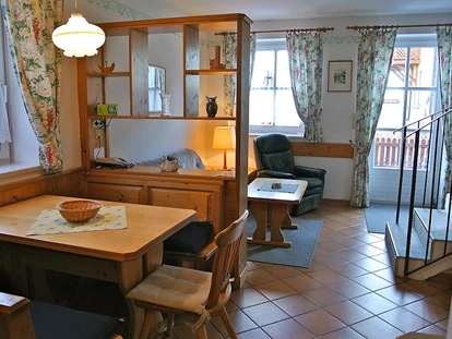 Pensionen - Restaurant - Wohnzimmer mit Ausgang zur Terrasse - Ferienapartment  im Biodorf Bad Waltersdorf