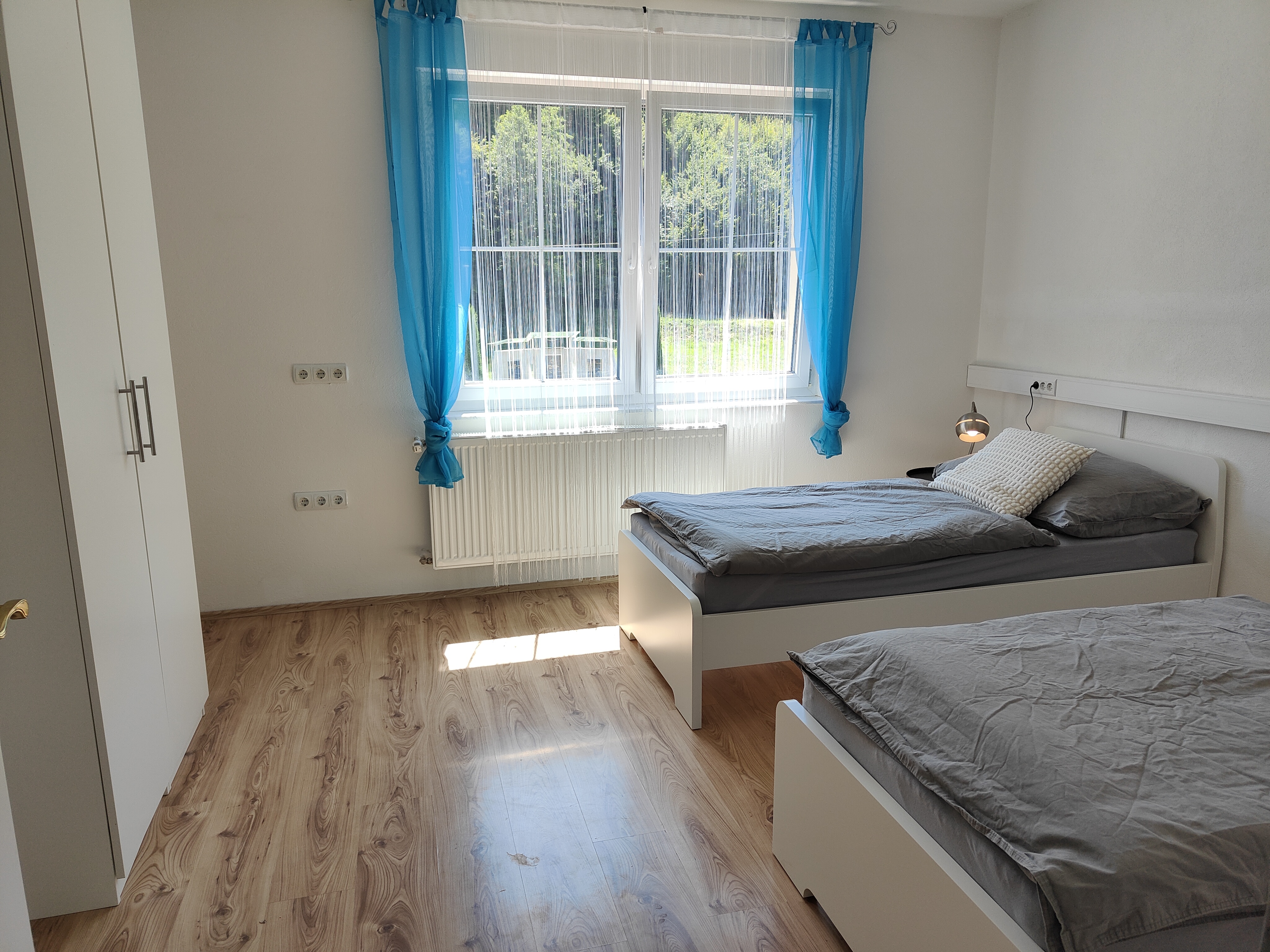 Ferienwohnung Dorfleben Zimmerkategorien Schlafzimmer mit zwei Einzelbetten