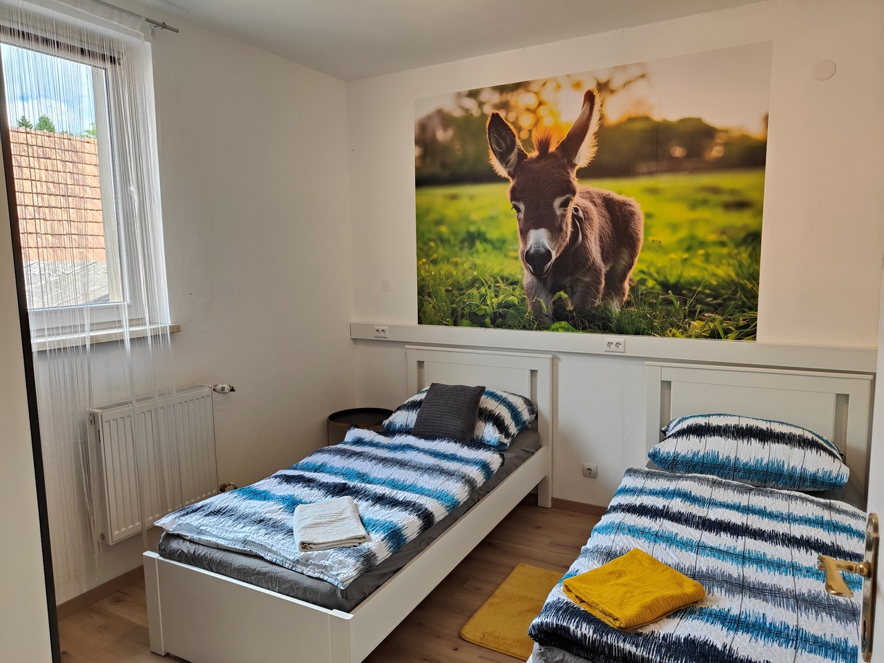 Ferienwohnung Dorfleben Zimmerkategorien Schlafzimmer mit 2 Einzelbetten