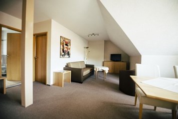 Frühstückspension: Wohnzimmer (Suite) - Pension Münchner Kindl