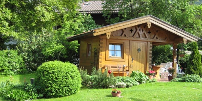 Pensionen - Region Chiemsee - Unser Gartenhaus mit Grillplatz - Demelhof