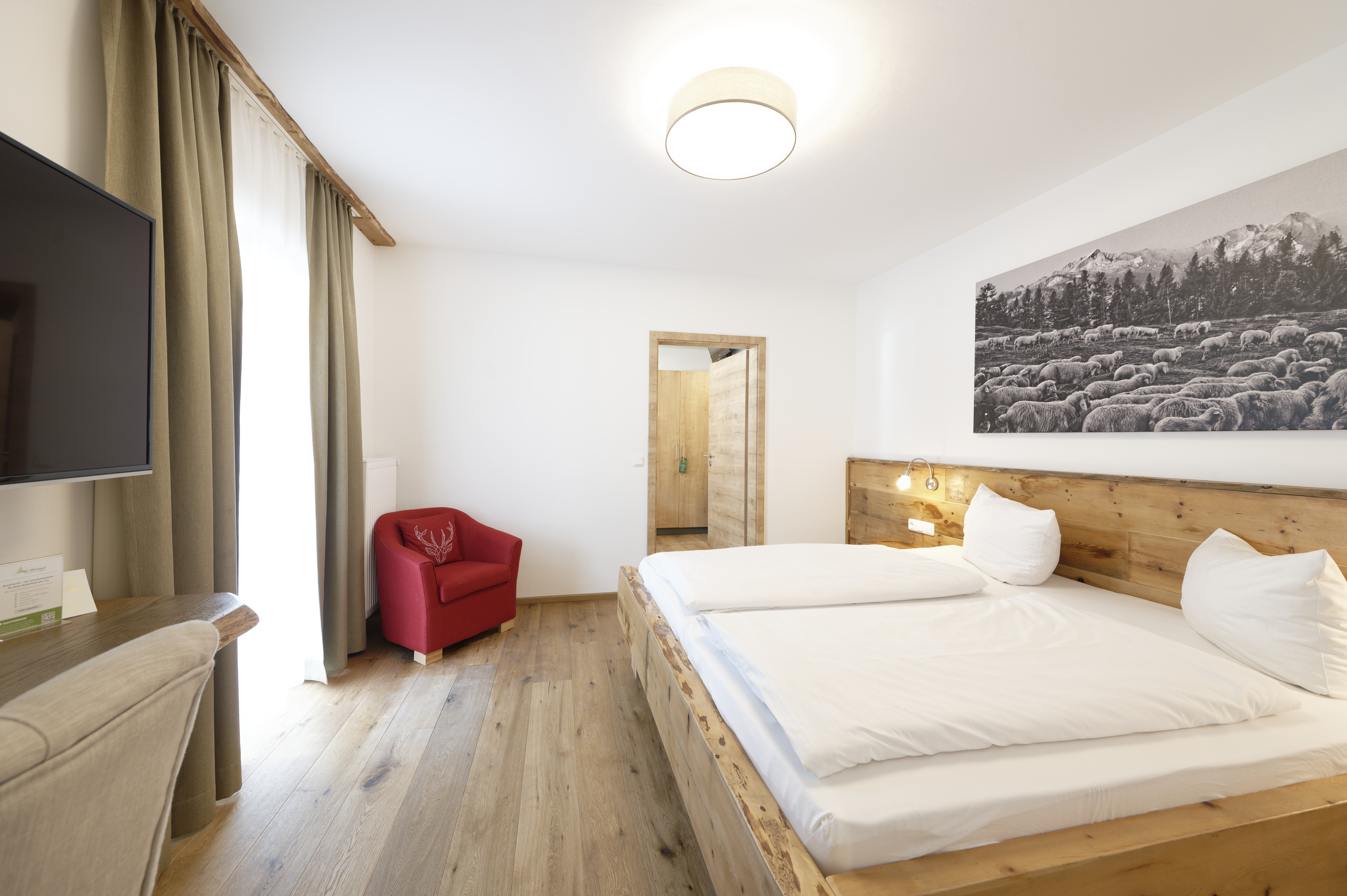 Hotel Garni Alpengruß Zimmerkategorien Vierbettzimmer mi Dachterrasse